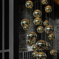Lustre LED contemporain en verre artistique avec plusieurs boules dorées pour hall d'hôtel, villa, grand lustre rond doré au design minimaliste
