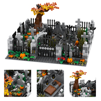 Ensemble de blocs de construction sur le thème de l'Halloween : cimetières, tombes, têtes de citrouille, croix et jouets inclus