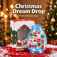 Jouet anti-stress transparent en forme de goutte d'eau, modèle Rêve de Noël, avec breloques Père Noël/Bonhomme de neige/Homme en pain d'épices, pour les 8-13 ans