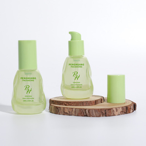 Bouteille d'huile capillaire en verre fantaisie verte de 30ml personnalisée irrégulière belle conception de pincement à la main huile essentielle humidité cosmétiques sérum cornue - Product Image 1