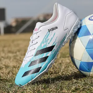 חדש קיץ 2021 גובה איכות נעלי כדורגל TF מכירה לוהטת גברים דשא אופנה חיצוני כדורגל נעלי לגבר oem מוצרים