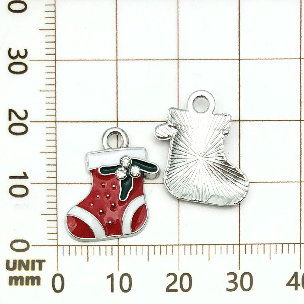 Une chaussette de Noël rouge, parsemée d'huile - 0,8g - 18*17mm - 19643