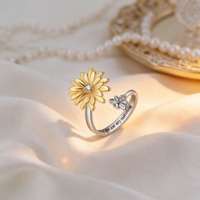 Bague tendance rotative Daisy en laiton plaqué or 18 carats, plaqué or rose, plaqué rhodium, argent 925 pour femme, idéale au quotidien