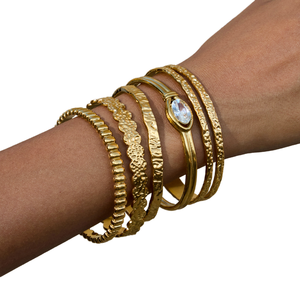 Bracelet jonc tendance en acier inoxydable et zircon pour femme, bijou de poignet en métal poli, couleurs or et argent, idéal pour les fêtes et occasions spéciales - Product Image 1