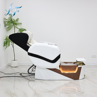 Fauteuil de pédicure de luxe avec massage par brume, bassin à LED pour les pieds et dossier inclinable pour salon de manucure et spa