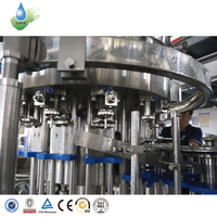 Machine de remplissage et de bouchage entièrement automatique pour boissons gazeuses, machine d'embouteillage pour boissons pétillantes, machine de remplissage de liquides