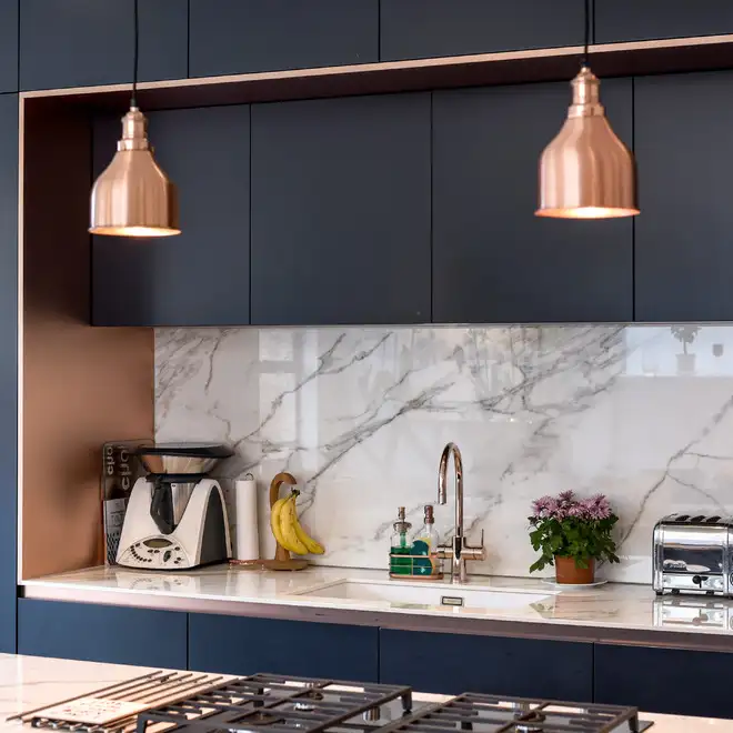 Australian fashionable kitchen cabinet set with light hardwood flooring island and white worktops blue