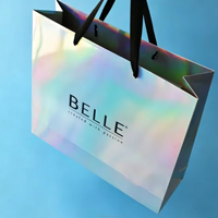Sacs cadeaux en papier holographique écologiques et recyclables en gros avec poignée en ruban gros-grain pour vêtements et articles de mode