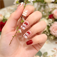 Faux ongles de Noël en ABS à presser, courts et carrés, avec motifs de bonbons et pointes rouges pour les doigts