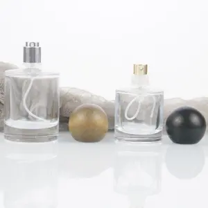 Factory sales 30ml 50ml Flat Shoulder Cosmetic Atomizing Fine Mist Spray Pump Glass Perfume Bottle with Wood Ball Lid