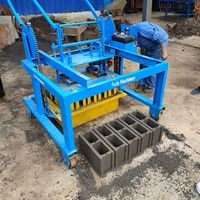 Machine à fabriquer des blocs creux en béton à base de cendres volantes Fuda Mobile, avec moule à engrenages, sans palette, ligne de production de briques, facile à utiliser, pression vibratoire 1