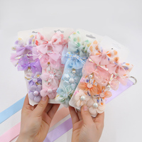Vente chaude en mousseline de soie arc 10 photos/ensemble pince à cheveux pour enfants boîte-cadeau couleur bonbon Floral bébé pinces à cheveux ensemble printemps été