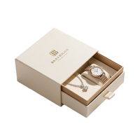 Boîte Cadeau Blanche de Luxe Personnalisée en Gros avec Lamination Mate, Doublure en Mousse, Estampage à Chaud Doré et Fermeture Magnétique en Carton