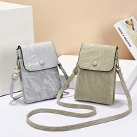 Nouvelle mode 2025, sac à téléphone portable en cuir PU, bandoulière, mini pochette imperméable pour téléphone et monnaie, fabriqué en Chine