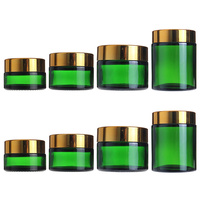 Pot de crème cosmétique de 30ml(1 oz) en verre vert vide et rechargeable avec bouchon noir pour crème pour le visage baume à lèvres