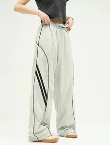 Streetwear marka özel bantlanmış Trackpants Polyester eğlence boy düz erkekler özel yan şerit joggers eşofman joggers
