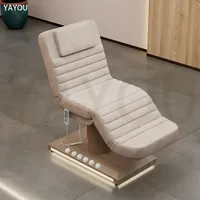 Lit de massage électrique à 3 moteurs avec base couleur bois et commande au pied pour salon de beauté