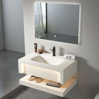 Meuble-lavabo mural moderne double couche en marbre avec vasque courbée à chaud, miroir et armoire flottante pour salle de bain d'hôtel