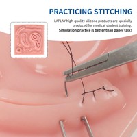 Coussin d'entraînement à la suture 3D en silicone et plastique avec fils de suture offerts pour la formation chirurgicale en milieu scolaire