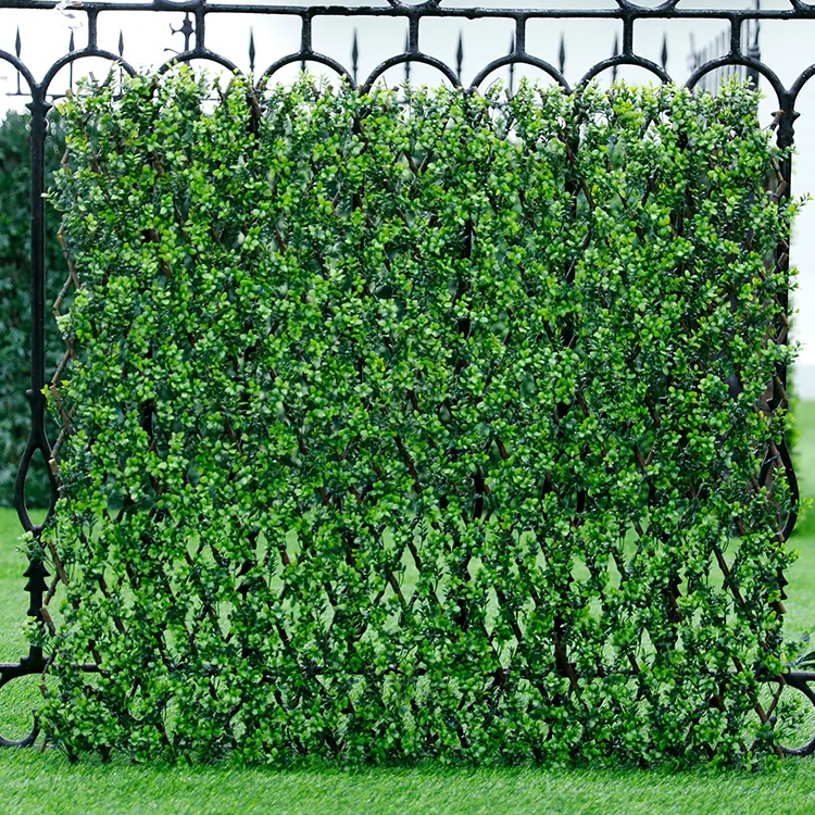 टिकाऊ भूनिर्माण प्लास्टिक सस्ते के लिए कृत्रिम घास पैनल पत्तियां हरे रंग की दीवार प्रणाली बाड़ संयंत्र दीवार सजावट