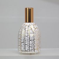 Vaporisateur professionnel personnalisé en or blanc et tête de pulvérisation de parfum en aluminium, flacon en verre de parfum de 50ml
