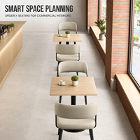 Ensemble de chaises de salle à manger à dossier incurvé en crème, pieds en métal noir, table en chêne clair pour hôtel, café, restaurant