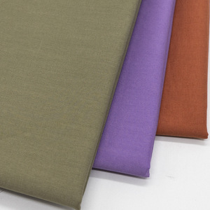 Tela de Algodón Elástica de Alta Calidad, Tejido Liso, Color Caqui, Disponible en Stock, Textil Premium para Camisas, Pantalones y Uniformes de Moda - Product Image 1
