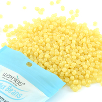 Sacs emballés de fèves de cire dure sans colophane OEM paillettes rose vert bleu forte élasticité sans allergie pour salon de beauté et épilation