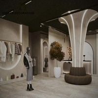 Meubles de magasin de vêtements de haute qualité, en bois massif, présentoirs de vêtements, comptoir de magasin de luxe, design pour magasin de vêtements