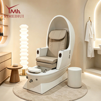 Fauteuil de pédicure spa en forme d'œuf, design luxueux entièrement fermé avec bassin pour les pieds intégré, équipement de salon de manucure