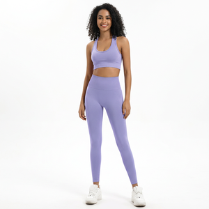 Conjunto de yoga sin costuras para mujer, morado lavanda, con sujetador deportivo tipo racerback y leggings de cintura media con cintura acanalada y efecto fruncido en glúteos, color liso, para gimnasio y fitness - Product Image 1