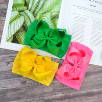 Vente en gros de bandeau en jacquard pour bébés de couleur unie, bandeau pour bébés avec nœud en nylon de 6.3 pouces pour enfants
