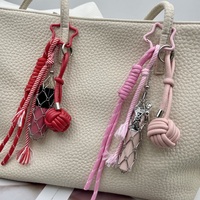 Pendentif en corde tressée tendance, porte-clés innovant en acier inoxydable, sac à rouge à lèvres en maille, petit pendentif boule, vente en gros