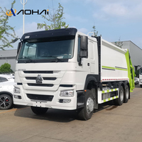 Camion Compacteur de Déchets HOWO 6x4 290HP à Transmission Manuelle, Moteur Diesel, Boîte de Vitesses, Chargeur Arrière à Vendre pour l'Exportation