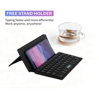 Mini clavier sans fil ergonomique pliable avec USB Type-C, design ultra-fin pour les voyages, clavier pour téléphone, tablette, Mac, Android