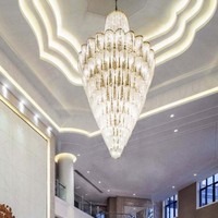 Lustre suspendu design en fer avec longues perles de cristal, pour escalier de villa, projet personnalisé, luxe moderne, LED blanc chaud