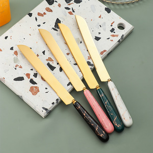 Set Regalo di Utensili da Cucina in Acciaio Inox con Manico in Ceramica: Paletta per Torte, Coltello per Burro, Pala per Pizza, Pala per Formaggio - Product Image 5