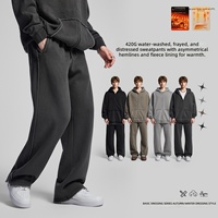 Celana Panjang Pria OEM 430gsm Katun Fleece Model Lurus  Cuci Asimetris Patchwork Raw Unfinished Hem Longgar Street Sweat Trousers