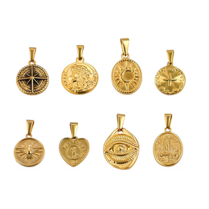 Charme en acier inoxydable plaqué or 18 carats PVD avec symboles spirituels et religieux |   Pendentifs Œil d'Horus, Vierge Marie, Croix, Oiseau sacré et Boussole - Product Image 1