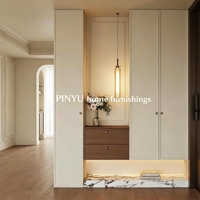 Armoire de rangement d'entrée bicolore beige et noyer en composite, avec plusieurs tiroirs, panneau en verre ondulé et miroir intégré