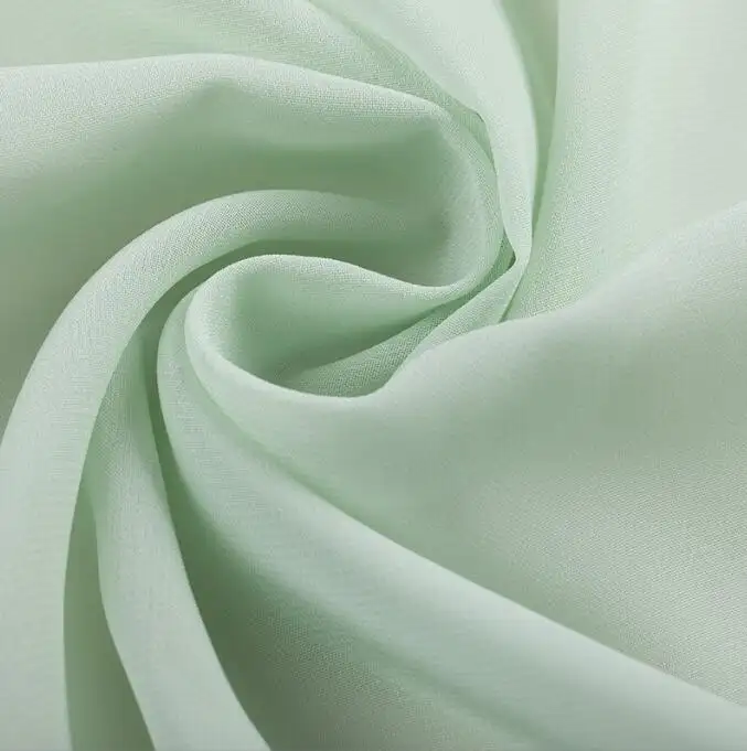 100% tissu en mousseline de soie 100D teint en polyester pour robe de mariée à doublure chemisier