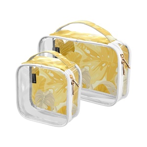 Lot de 2 mini trousses de toilette transparentes en PVC avec motif floral hawaïen jaune, organiseurs de maquillage, pochettes de voyage - Product Image 1