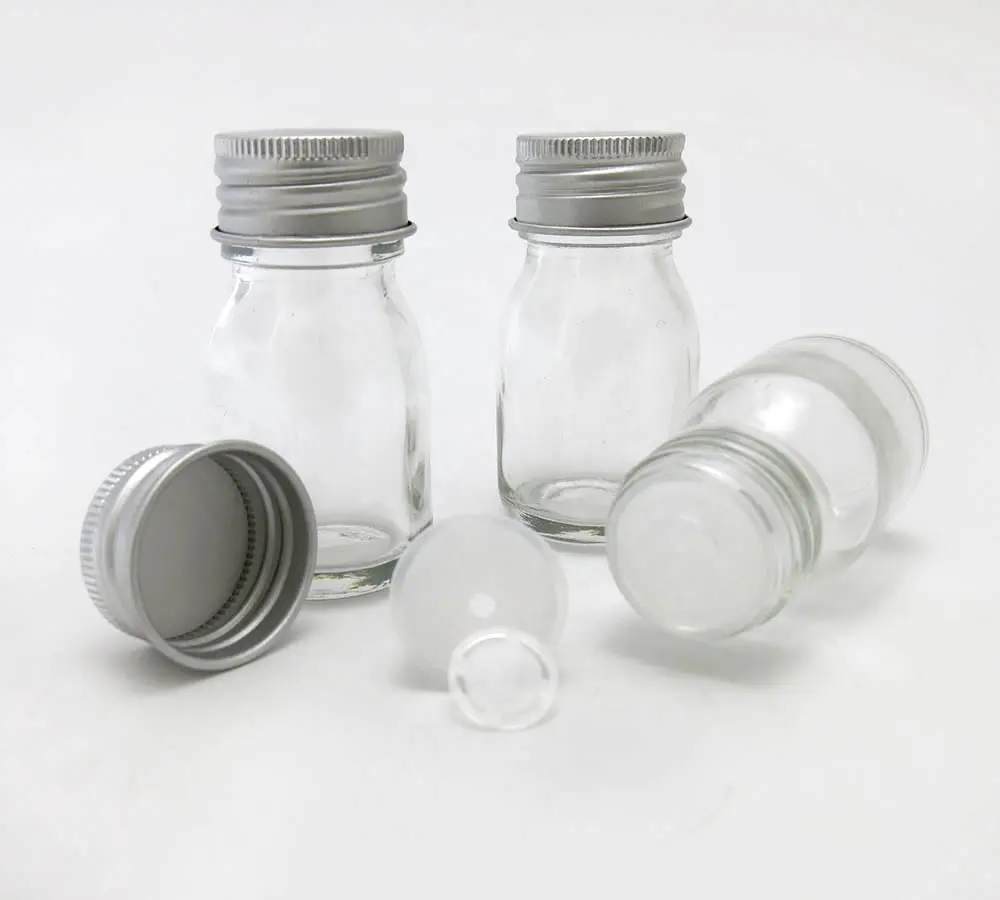 詰め替え可能な空の30ml透明ガラスボトル、アルミニウムキャップ付き、エッセンシャルオイル用の1オンス透明ガラス容器を挿入