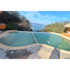 Revestimiento Arquitectónico Decorativo de Yeso Chukum Natural Premium para Piscinas con Espejo de Agua en Patios Interiores, para un Acabado Moderno - Product Image 3