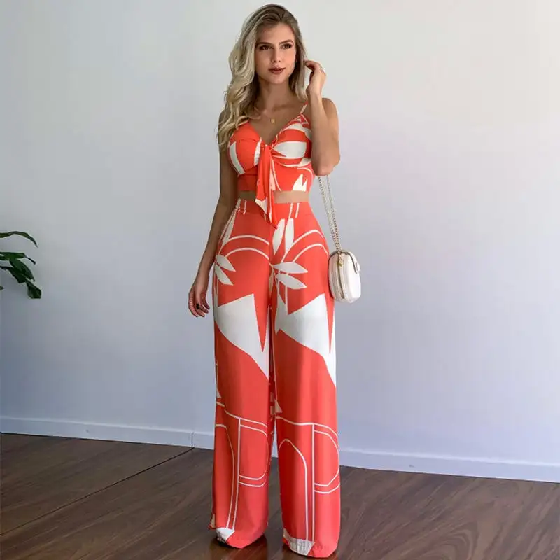 Conjunto de duas peças de calças flare estampadas estilo férias para mulheres, top cropped de verão com decote em V e cintura alta