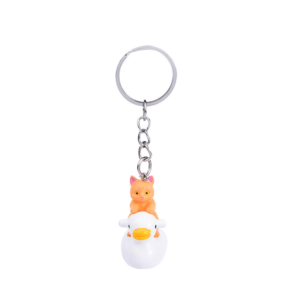 White duck + yellow cat keychain