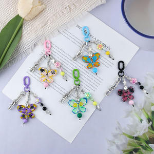 Pendentif de sac de téléphone papillon mignon en alliage de petite fleur avec perle galvanisée en résine créative - Product Image 1