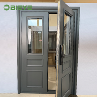 Puerta de Entrada Doble Abatible Manual de Vidrio Negro con Acabado de Aleación de Aluminio para Villa Moderna