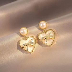 Pendientes de moda coreana al por mayor, pendientes colgantes de corazón en blanco y negro, pendientes de lazo con diamantes - Product Image 4