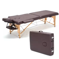 Table de massage et de soin du visage moderne en cuir synthétique pliable de luxe, portable, en bois, pour hôtel, salle de sport, salle de bain